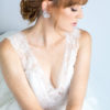 A bride in a wedding dress and tiara, showcasing Cedar Wood Earrings, set against a Chicago