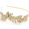 Gold Rose Petal Tea Headband adorned with crystal leaves, displayed against a Chicago