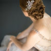 Bride wearing an Ice Sprinkles Headpiece, featuring a delicate hair comb in her hair, in Chicago