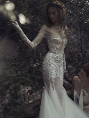 Kim Kassas Daphne Wedding Dress with applique, corset, lace, sheer skirt, and mermaid train available at a bridal shop in Chicago, IL