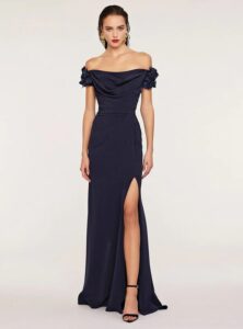 Off the shoulder gown with floral details and a leg slit.