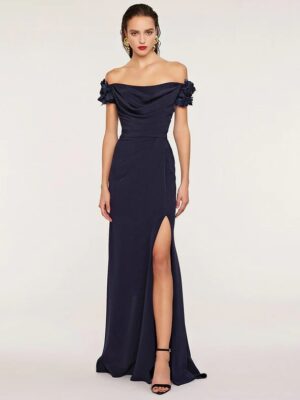 Off the shoulder gown with floral details and a leg slit.