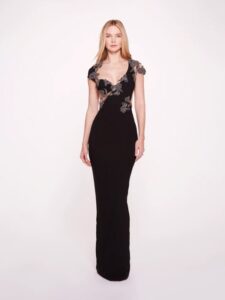 Evening wear dress with a scoop neckline and open back.