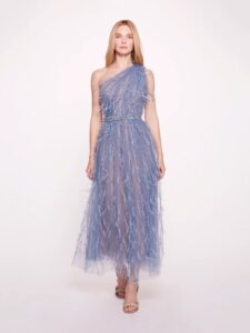 Tea length evening wear gown with one shoulder strap and ostrich feathers.