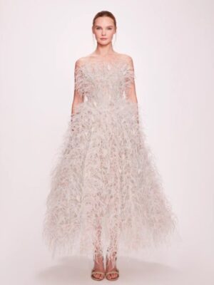 Strapless tea length ballgown dress with ostrich and duck feathers.