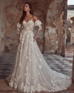 A-line 3D floral wedding gown with sleeves.