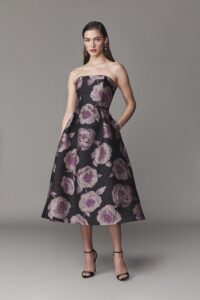 Strapless evening dress, full skirt silhouette with crinoline and floral pattern. 