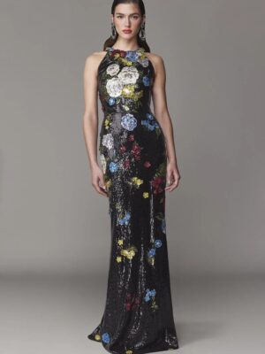 Halter gown with a fit and flare skirt silhouette. This evening gown is completed with stunning floral detailing. 