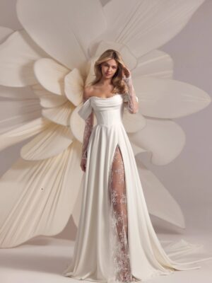 A-line wedding gown with off the shoulder straps and lace sleeves.