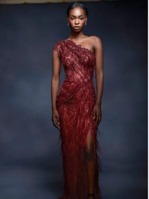 One shoulder gown with skirt slit in beaded ostrich feather embroidery