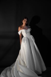 Clean Basque waist ball gown with draped bodice and pleated detailing