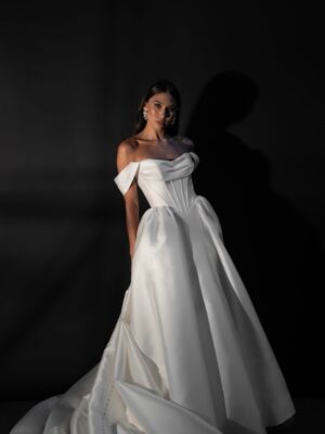 Clean Basque waist ball gown with draped bodice and pleated detailing