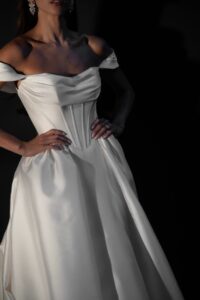 Clean Basque waist ball gown with draped bodice and pleated detailing