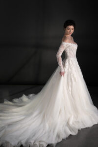 Off-the-shoulder long sleeve tulle ballgown with embroidered chantilly lace basque waist ballgown