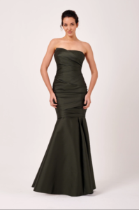 This stunning full-length formal gown is sure to turn heads. Crafted from luxurious mikado woven fabric, it combines elegance and sophistication with every step. The rich texture of the fabric enhances its graceful silhouette, making it the perfect choice for a memorable evening. 