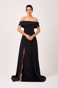 This gorgeous formal dress is composed of a woven mikado fabric. It is fitted around the bodice and skirt and features