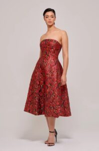 Crafted in a flattering fit-and-flare silhouette, this A-line midi-length dress features a chic strapless neckline for a timeless, feminine look. Made from floral-textured metallic jacquard fabric in vibrant multicolor, it exudes elegance and a touch of luxury, perfect for making a statement at any special occasion.