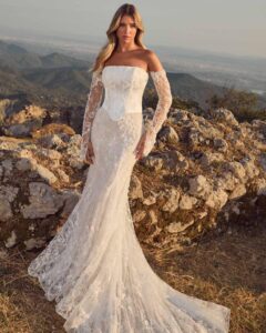 Romantic lace fitted dress featuring a corset bodice.