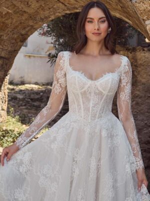 Romantic lace long sleeve a-line wedding gown.