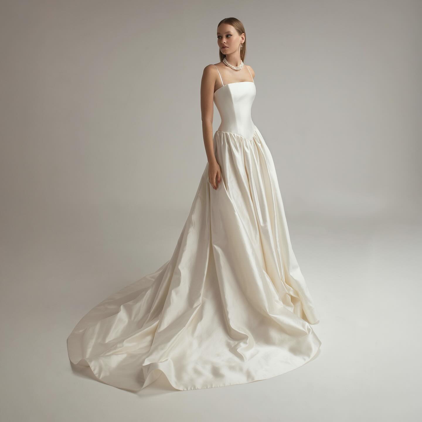Bride in a stunning Neta Dover Valentina wedding dress from a Chicago bridal store