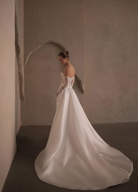 A side view of a bride's wedding dress
