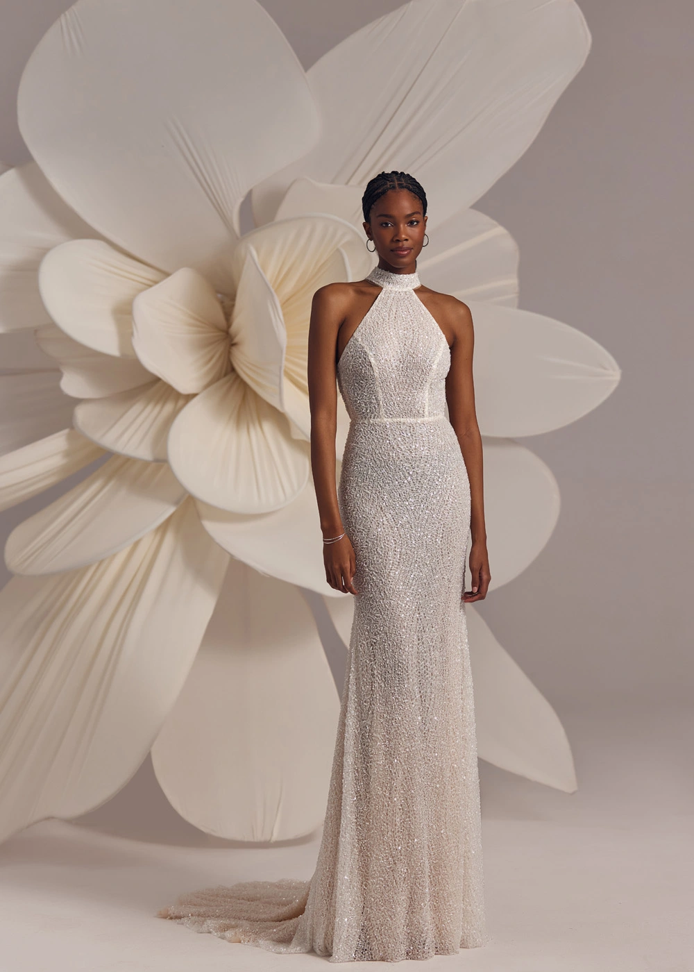 Ivory halterneck beaded dress with natural waistline and straight silhouette
