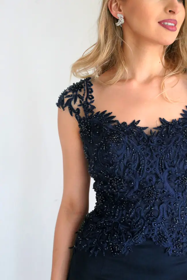 Crepe gown with textured lace top from our evening wear store in Chicago